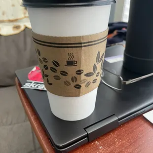 16oz cup with the recyclable cardboard heat guard.