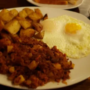 The corn beef hash breakfast looks old