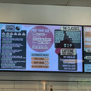 menus on a large screen in a restaurant