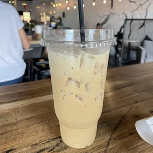 a cold beverage in a plastic cup