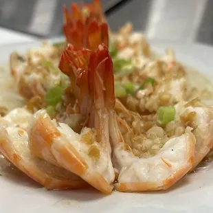 a plate of shrimp and rice