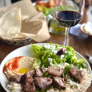 Filet Mignon Kabobs with hummus, rice and Open Sesame salad with Pessimist wine.