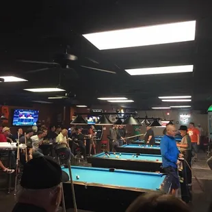 a pool table and a bar