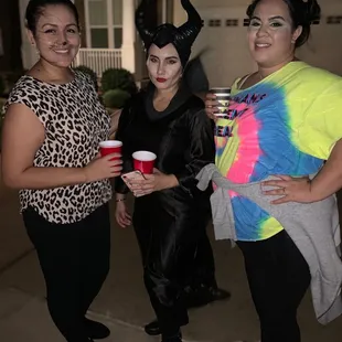 three women dressed as maleficents