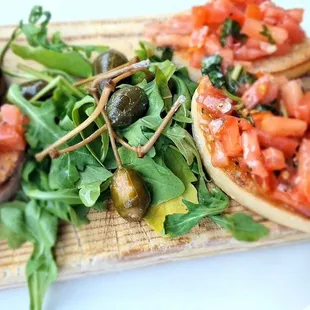 a variety of appetizers on a cutting board