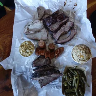 Turkey, pork loin, cheddar jalapeño sausage, spare ribs, brisket; spicy creamed corn, tator tot casserole, green beans