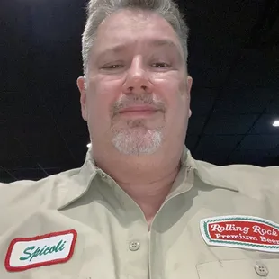 a man wearing a khaki uniform