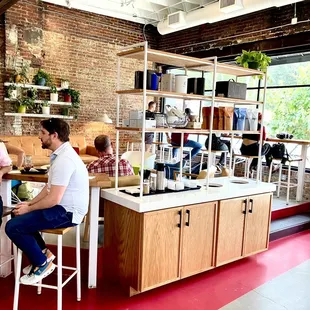 two men sitting at a counter