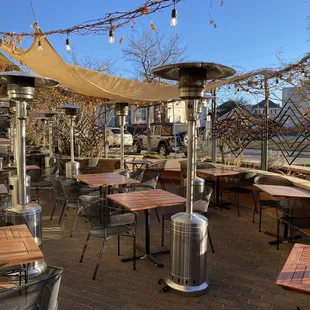 More outdoor dining with fans and heaters