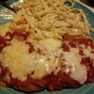 Chicken parmesan with a side of fettuccine
