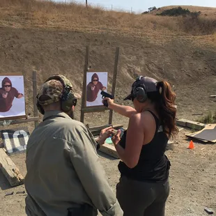 Skill building at an intermediate pistol course.