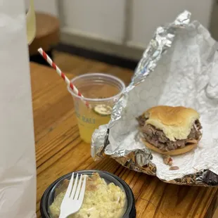 Noble smoke Pork Sandwich and Mac-n-Chz. Maleficent fairy drink.