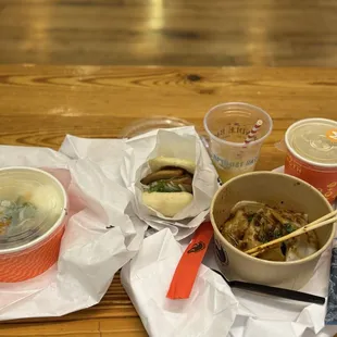 A little bit of everything: left to right: miso ramen with soft egg, OG bao bun, maleficent fairy drink, chendu dumplings. Broth.