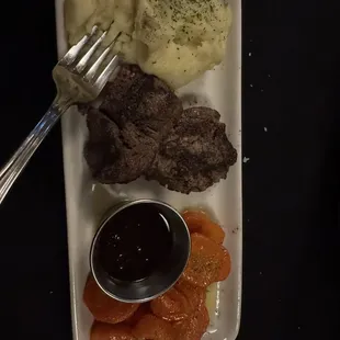 Mashed potatoes, tenderloin, and maple carrots