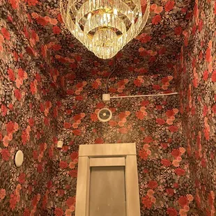 a chandelier in a bathroom