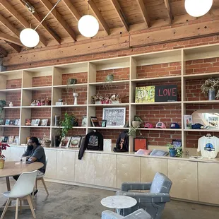 Merch, seating and lighting all feel very intentional.