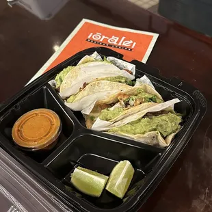 The asada, pollo, and Al pastor tacos