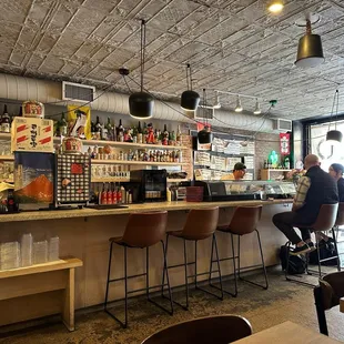 a man sitting at a bar