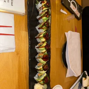 a sushi platter on a wooden table