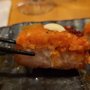 Crispy rice topped with spicy salmon. Topped with jalapeños.