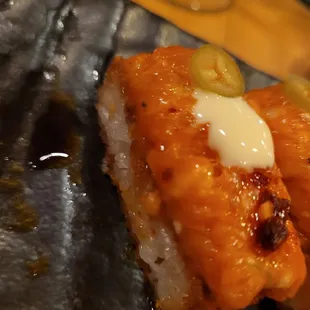 Crispy rice topped with spicy salmon