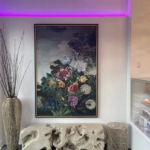 a painting of flowers in a vase