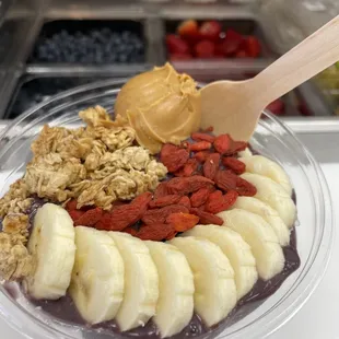 a bowl of fruit and nuts