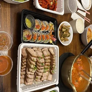 a table full of asian food