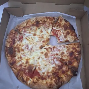 I couldn't wait to taste it LOL. Small cheese and garlic pizza. It was perfect.