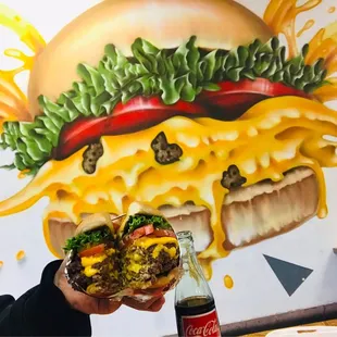 They make the burger look identical to the photo on the wall. Nice