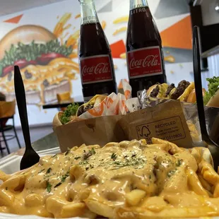 a plate of pasta and fries