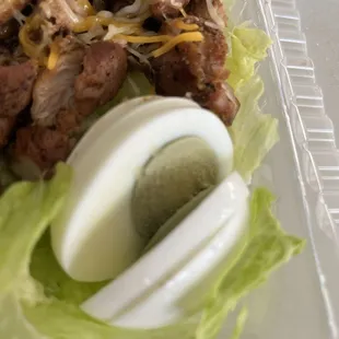 Why is the egg always green inside when I order the chicken salad? I always have to throw it out to avoid food poisoning
