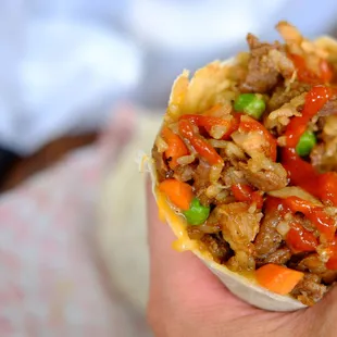 Beef teriyaki and chicken burrito