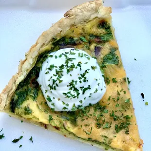 Quiche. Bacon egg and cheese. Small portion, light and delicious breakfast. I really loved it.