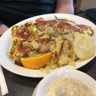 Full size pepperoni and cheese omelette with a side of gravy