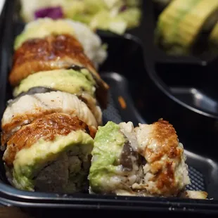 a tray of sushi