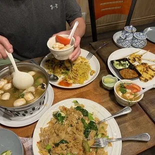 2. Pad See Ew 5. Shrimp Tom Yum 3. Pineapple Fried Rice chick 8. Chicken Satay