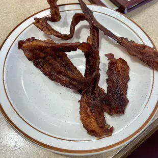 Side of bacon well done