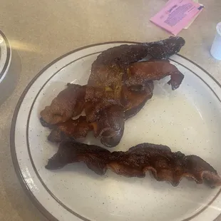 bacon on a white plate