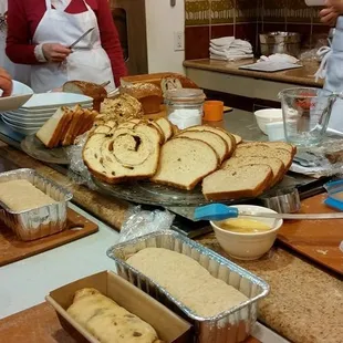 sampling delicious breads while waiting for our own to rise