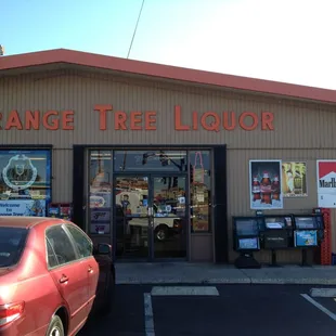 a car parked in front of the store