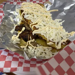 Cachapas with cheese, beef, and plantains.