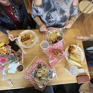 Cachapas, taqueños, and pasticho, oh my  Drinks are maltín and papelón con limón