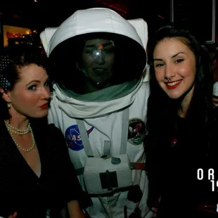 two women and an astronaut
