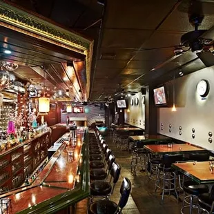 a view of a bar with a clock on the wall