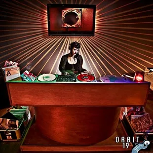 a woman preparing food in a restaurant