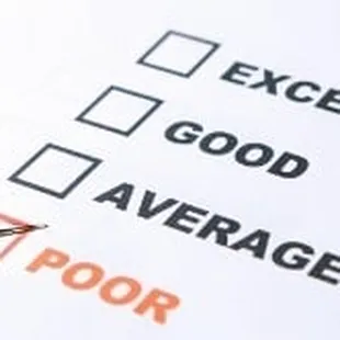 a close up of a checklist with a pen