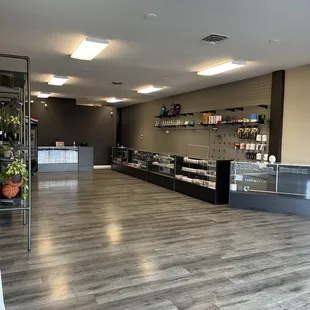Making our way to stock these display cases!  Vapes, smoke essentials, house-plants, and rare snacks + sodas.