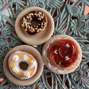 three donuts on a table