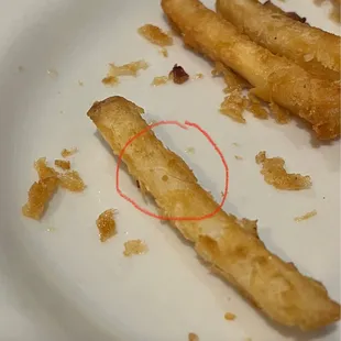A different fry with hair on it.